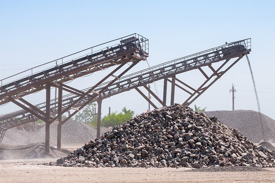 Bulk material conveying systems